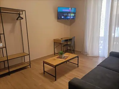 a glass shelf in the corner of a room at Borgese Apartments in Palermo