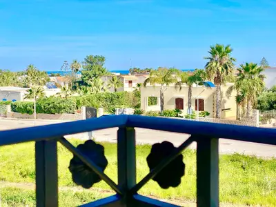 a view of a house from a balcony at Residence Piana, San Vito Lo Capo in San Vito lo Capo