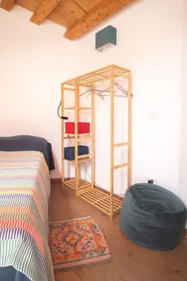 a bedroom with a bed and a mirror in a room at Summaq Terrace in Palermo