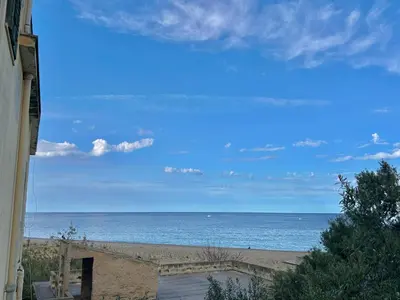 a view of the ocean from a building at La Terrazza del Mare in Palermo