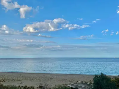 a view of the ocean from a beach at La Terrazza del Mare in Palermo