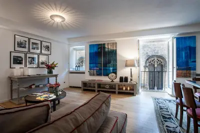 a living room with a couch and a table at BB 22 Palace in Palermo