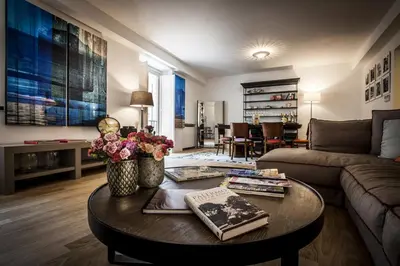 a living room with a coffee table and a couch at BB 22 Palace in Palermo