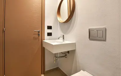 a bathroom with a sink and a mirror at Stunning Apartment In Trappeto in Trappeto