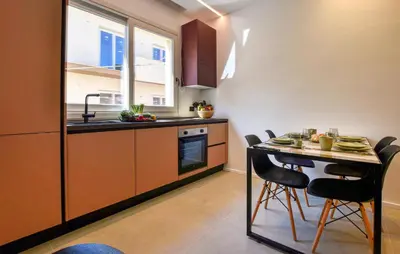 a kitchen with a table and chairs in a room at Stunning Apartment In Trappeto in Trappeto