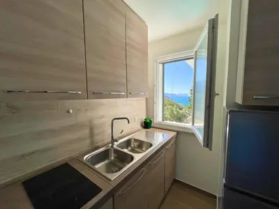 a small kitchen with a sink and a window at VFH Residence Flavia -Tre Piscine in Santa Flavia