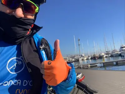 a person giving a thumbs up at a marina at Mondello Key loft in Palermo