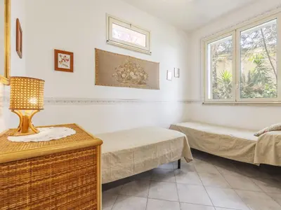 a room with two beds and a window at Apartment Cicladi Mikonos by Interhome in Santa Flavia