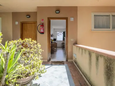 a hallway of a house with plants and a corridor at Apartment Cicladi Paros by Interhome in Santa Flavia