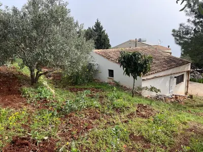 a white house sitting on top of a hill at Lally in the Sky moderno monovano panoramico ed accessoriato in Scopello