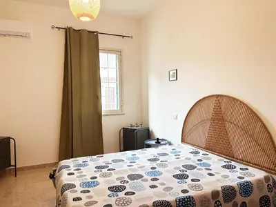 a bedroom with a bed and a window at Dai Nonni in Terrasini