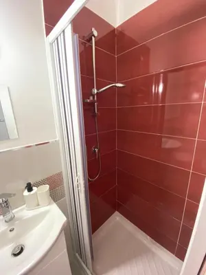 a bathroom with a shower and a sink at Palazzo Castelli alla Zisa in Palermo
