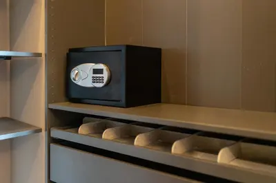 a microwave sitting on a shelf in a closet at Le Dimore - Ponte 7 in Palermo
