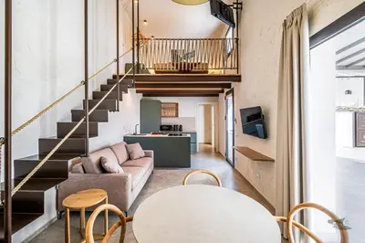 a living room with a couch and a table at Villa Castello in Balestrate
