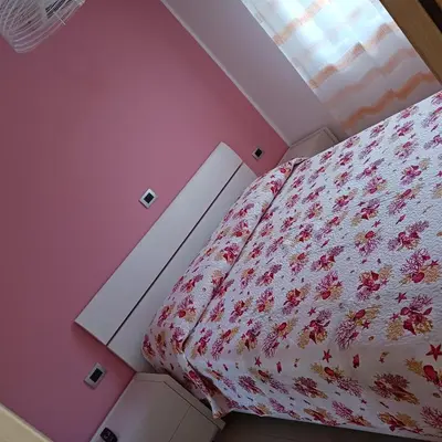 an overhead view of a bed in a bedroom at Villetta al villaggio 101 pini in Campofelice di Roccella