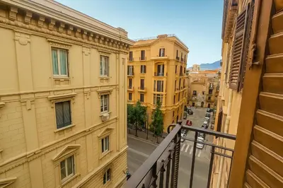 a view of a city street from a balcony at GoriziaHome in Palermo