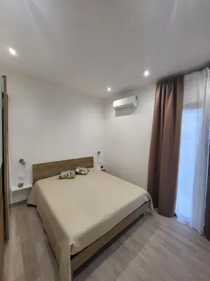 a bedroom with a large bed in a room at Sguardo a Ponente in Castellammare del Golfo