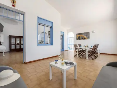 a large living room with a table and chairs at Apartment Terrazza sul Mare by Interhome in Balestrate