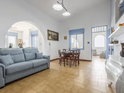 a living room with a couch and a table at Apartment Terrazza sul Mare by Interhome in Balestrate