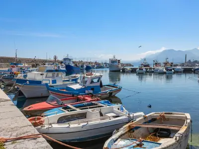 a bunch of boats are docked in a harbor at Apartment Cicladi Naxos by Interhome in Santa Flavia