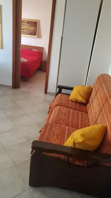 a bed with two pillows on it in a room at Al Politeama casa vacanze in Palermo