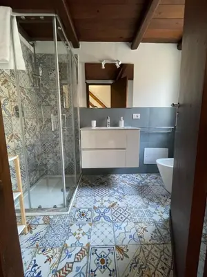 a bathroom with a shower and a sink at Casa di Reginaldo al Capo in Palermo
