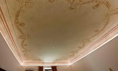 a ceiling with a painting of flowers on it at Massimo Rooms and suite in Palermo