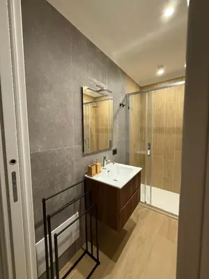 a bathroom with a sink and a shower at Villa Anthea - Relax vista mare tra Palermo e Cefalù in Trabia