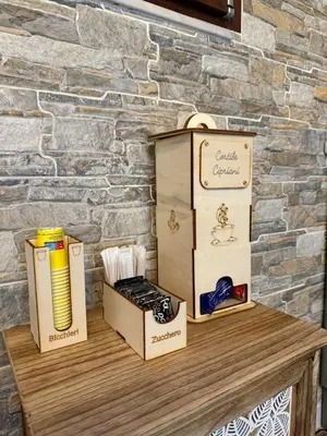 three boxes sitting on top of a table at Cortile Cipriani in Palermo