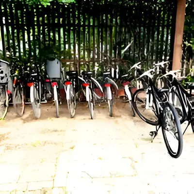 a row of bikes parked next to a fence at Casa Giulù in Palermo