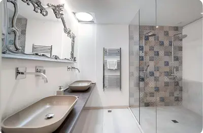 a bathroom with a sink and a shower at Casa Giulù in Palermo