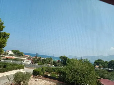 a view of the ocean from a house at Aura azzurra in Carini