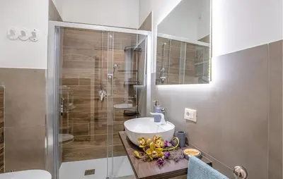 a bathroom with a sink and a shower at Beautiful Apartment In Balestrate in Balestrate