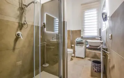a bathroom with a shower and a toilet at Beautiful Apartment In Balestrate in Balestrate