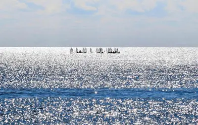 a group of sailboats in the ocean on the water at Beautiful Apartment In Balestrate in Balestrate
