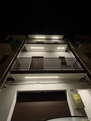 an overhead view of a building with a balcony at Giulia's Apartment in Altavilla Milicia