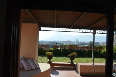 a room with a large window with a view at Appartamento con vista in Palermo