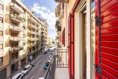 a view of a city street from a balcony at MG Apartment in Palermo