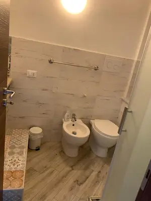 a bathroom with a toilet and a bidet at Risvegliarsi a Danisinni in Palermo