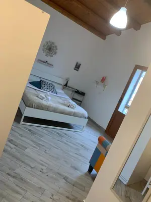 a view of a bedroom with a bed at Risvegliarsi a Danisinni in Palermo
