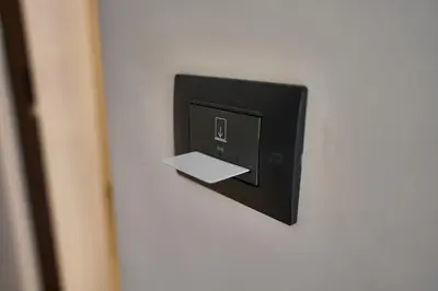 a wall outlet with a piece of paper on it at Harmony Lux in Bagheria
