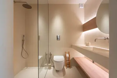 a bathroom with a toilet and a shower at Ammare Luxury Villa by Le Dhome Sicily in Trappeto