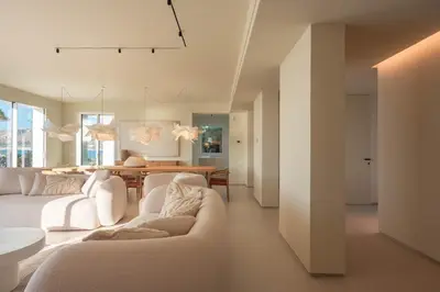 a living room with two white couches and a table at Ammare Luxury Villa by Le Dhome Sicily in Trappeto
