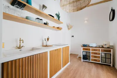 a kitchen with a sink and a counter top at Sea House - Suite vista mare in Terrasini
