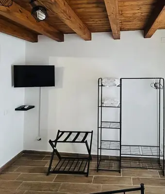 a bathroom with a toilet and a shower at La Casetta in Piazza in Palermo