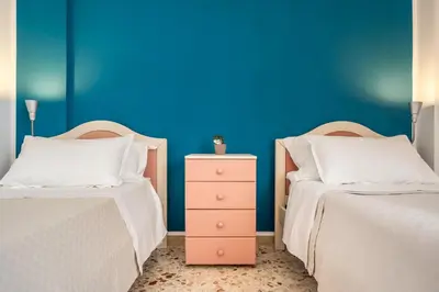 a bathroom with a sink and a toilet at Centoquaranta Apartment in Terrasini