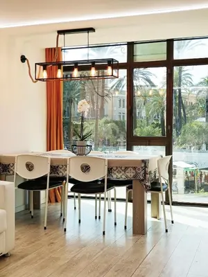 a dining room with a table and chairs at Domus Sicula Palermo city center in Palermo
