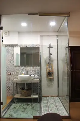 a bathroom with a sink and a shower at La casa del Cavaliere in Palermo