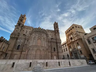 a large building with a sky in the background at Palazzo dei Duchi D'Amico - Apartment -