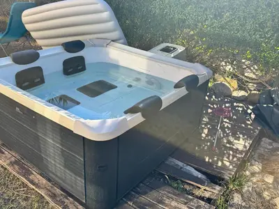 a hot tub sitting on top of a table at Villa Altavilla in Altavilla Milicia